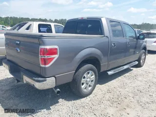 2013 Ford F-150 XL with VIN 1FTFW1CT3DKG38788, listed as a IAAI auction lot 42030091 with 158,213 mi miles. Bid and sale history available at carsss.com. Image 4.
