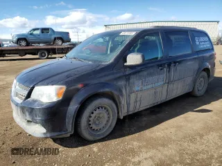 2011 Dodge Grand Caravan SXT with VIN 2D4RN4DG6BR748061, listed as a Copart auction lot 49673385 with 187,129 mi miles and Salvage Title. Bid and sale history available at DreamBid. Image 1.