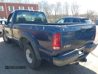 2002 Ford Super Duty F-250 XL with VIN 1FTNF20L92EA36463, listed as a IAAI auction lot 41994490 with 113,802 mi miles. Bid and sale history available at carsss.com. Image 3.
