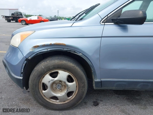 2007 Honda CR-V LX with VIN JHLRE48317C057561, listed as a IAAI auction lot 42119266 with 307,373 mi miles. Bid and sale history available at carsss.com. Image 6.