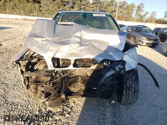 2000 BMW X5 4.4i with VIN WBAFB3355YLH05755, listed as a Copart auction lot 77136744 with 0 mi miles and Salvage Title. Bid and sale history available at carsss.com. Image 5.