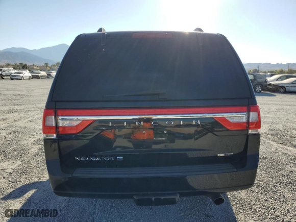 2016 Lincoln Navigator L with VIN 5LMJJ3HTXGEL08591, listed as a Copart auction lot 70049694 with 123,971 mi miles and Salvage Title. Bid and sale history available at carsss.com. Image 6.