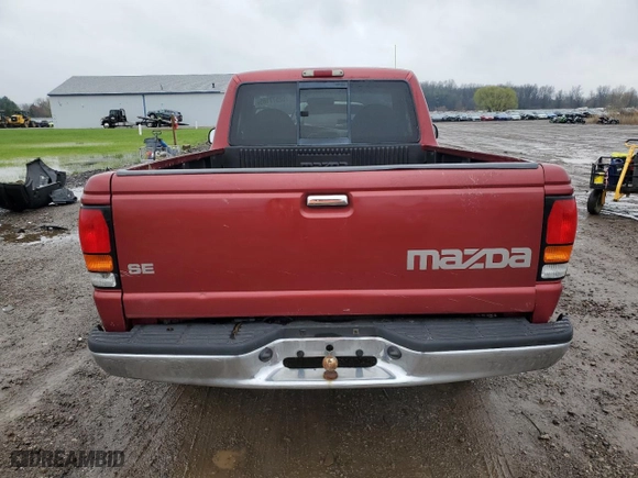 1999 Mazda B-Series 2WD Truck SX with VIN 4F4YR12C2XTM08473, listed as a Copart auction lot 52577185 with 173,620 mi miles and Salvage Title. Bid and sale history available at carsss.com. Image 6.