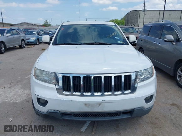 2011 Jeep Grand Cherokee 70th Anniversary with VIN 1J4RR4GG4BC562003, listed as a IAAI auction lot 42022419 with 231,786 mi miles. Bid and sale history available at carsss.com. Image 6.