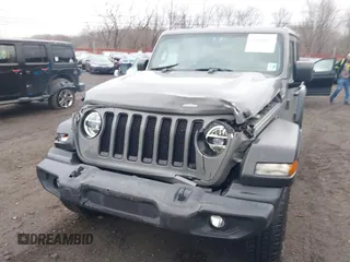 2021 Jeep Wrangler Unlimited Sport S with VIN 1C4HJXDG5MW614688, listed as a IAAI auction lot 41678964 with 89,309 mi miles. Bid and sale history available at carsss.com. Image 6.