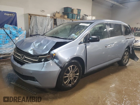 2013 Honda Odyssey EX-L with VIN 5FNRL5H64DB080141, listed as a Copart auction lot 49553235 with 128,358 mi miles and Salvage Title. Bid and sale history available at carsss.com. Image 1.