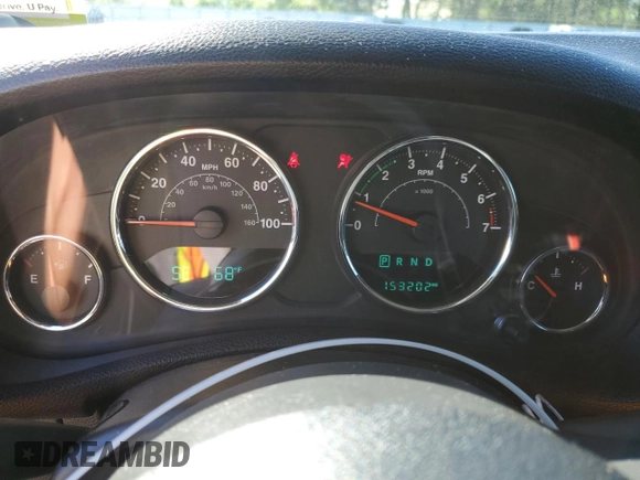2015 Jeep Wrangler Unlimited Willys Wheeler with VIN 1C4BJWDG5FL609110, listed as a Copart auction lot 56013255 with 153,202 mi miles and Clean Title. Bid and sale history available at DreamBid. Image 9.
