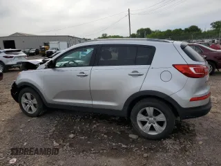 2012 Kia Sportage LX z VIN KNDPB3A29C7264856, wystawiony jako Copart lot #58397685 z przebiegiem 144 621 mil mil oraz Szkoda całkowita • Salvage title. Historia ofert i sprzedaży dostępna na DreamBid. Obrazek 2.