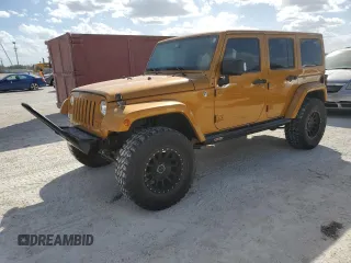 2014 Jeep Wrangler Unlimited Rubicon X with VIN 1C4HJWFGXEL167737, listed as a Copart auction lot 77240414 with 97,721 mi miles and Non repairable. Bid and sale history available at DreamBid. Image 1.