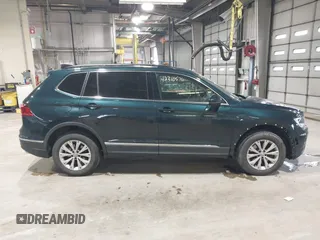 2018 Volkswagen Tiguan SEL with VIN 3VV2B7AX8JM113976, listed as a IAAI auction lot 42310576 with 100,319 mi miles and . Bid and sale history available at DreamBid. Image 13.