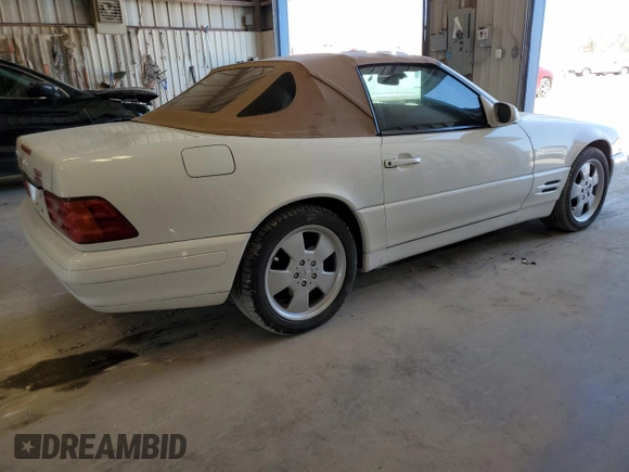1999 Mercedes-Benz SL-Class with VIN WDBFA68F2XF179134, listed as a Copart auction lot 67335014 with 68,406 mi miles and Clean Title. Bid and sale history available at carsss.com. Image 3.