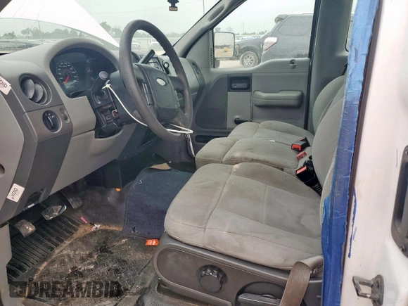 2007 Ford F-150 XL with VIN 1FTRF12W17NA45281, listed as a Copart auction lot 57342005 with 165,058 mi miles and Salvage title. Bid and sale history available at DreamBid. Image 7.