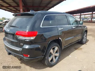 2014 Jeep Grand Cherokee Overland with VIN 1C4RJFCG4EC273786, listed as a IAAI auction lot 41901304 with 73,055 mi miles. Bid and sale history available at carsss.com. Image 4.