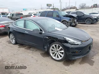 2018 Tesla Model 3 Long Range Battery with VIN 5YJ3E1EA6JF176236, listed as a IAAI auction lot 41470753 with 181,827 mi miles. Bid and sale history available at carsss.com. Image 1.