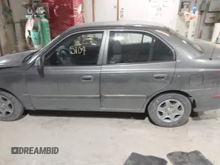 2004 Hyundai Accent GL with VIN KMHCG45C44U528783, listed as a IAAI auction lot 41535104 with 1 mi miles. Bid and sale history available at carsss.com. Image 14.