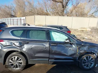 2020 Hyundai Santa Fe Limited with VIN 5NMS5CAD9LH273715, listed as a IAAI auction lot 41259190 with 14,669 mi miles and . Bid and sale history available at DreamBid. Image 12.