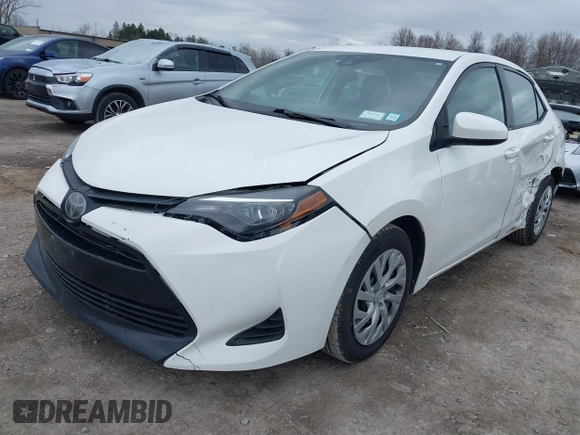 2019 Toyota Corolla L with VIN 5YFBURHE0KP889909, listed as a IAAI auction lot 41888953 with 130,529 mi miles. Bid and sale history available at carsss.com. Image 18.