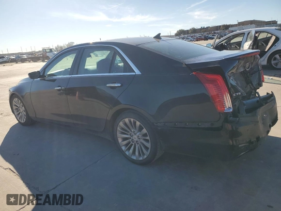 2014 Cadillac CTS Performance RWD with VIN 1G6AS5SX7E0184479, listed as a Copart auction lot 87076074 with 121,927 mi miles and Clean title. Bid and sale history available at DreamBid. Image 2.