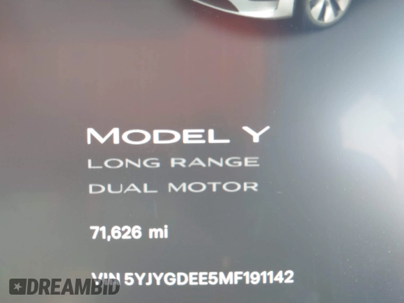 2021 Tesla Model Y Long Range with VIN 5YJYGDEE5MF191142, listed as a IAAI auction lot 41448514 with 71,626 mi miles. Bid and sale history available at carsss.com. Image 16.