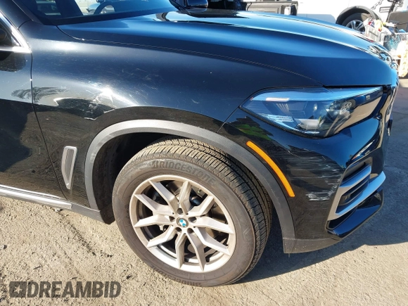 2023 BMW X5 sDrive40i with VIN 5UXCR4C01P9R58557, listed as a IAAI auction lot 41826741 with 10,142 mi miles. Bid and sale history available at carsss.com. Image 6.