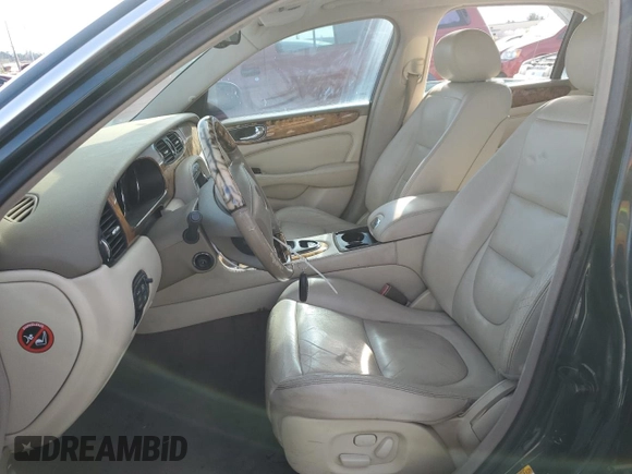 2004 Jaguar XJ with VIN SAJWA71C34SG29498, listed as a Copart auction lot 42653715 with 116,956 mi miles and Salvage Title. Bid and sale history available at carsss.com. Image 7.