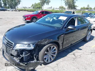 2013 Audi A7 Premium Plus with VIN WAUYGAFCXDN132677, listed as a IAAI auction lot 42630446 with 132,398 mi miles and . Bid and sale history available at DreamBid. Image 2.