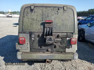 2001 Jeep Wrangler Sport with VIN 1J4FA49SX1P318889, listed as a Copart auction lot 67213064 with 157,444 mi miles and Clean Title. Bid and sale history available at carsss.com. Image 6.