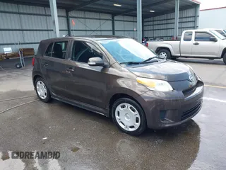 2011 Scion xD with VIN JTKKU4B43B1009690, listed as a IAAI auction lot 42444778 with 210,517 mi miles and . Bid and sale history available at DreamBid. Image 1.