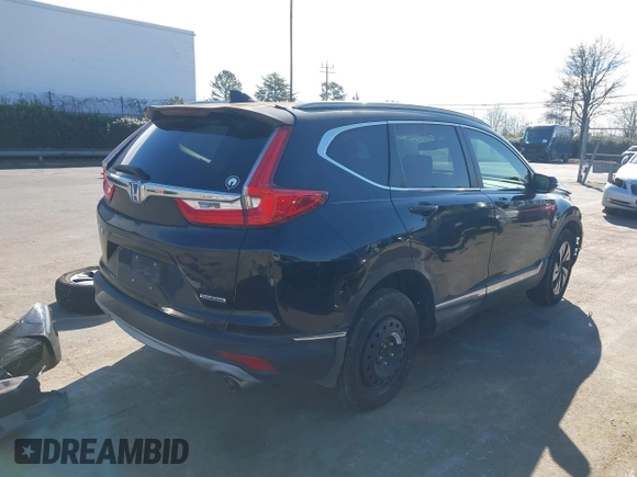 2017 Honda CR-V Touring with VIN 5J6RW1H97HL010429, listed as a IAAI auction lot 41151412 with 89,685 mi miles. Bid and sale history available at carsss.com. Image 4.