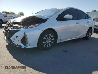 2021 Toyota Prius LE z VIN JTDKAMFP6M3191509, wystawiony jako Copart lot #60153785 z przebiegiem 112 625 mil mil oraz Szkoda całkowita • Salvage title. Historia ofert i sprzedaży dostępna na DreamBid. Obrazek 1.