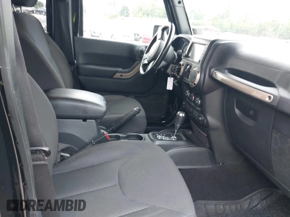 2016 Jeep Wrangler Unlimited Sahara z VIN 1C4HJWEG3GL343340, wystawiony jako IAAI lot #42683859 z przebiegiem 92 878 mil mil oraz . Historia ofert i sprzedaży dostępna na DreamBid. Obrazek 5.