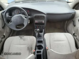 2002 Saturn SL with VIN 1G8ZF52872Z183427, listed as a Copart auction lot 42719665 with 154,393 mi miles and Salvage Title. Bid and sale history available at carsss.com. Image 8.