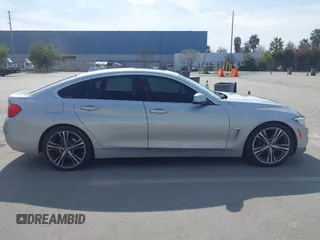 2016 BMW 4 Series 428i with VIN WBA4A9C55GG695469, listed as a IAAI auction lot 41753857 with 90,692 mi miles. Bid and sale history available at carsss.com. Image 13.