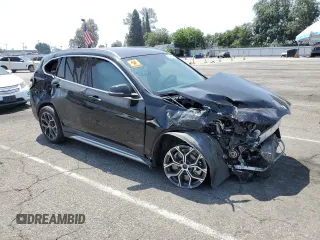 2021 BMW X1 xDrive28i с VIN WBXJG9C0XM5T71386, выставлен на аукционе Copart как лот 60486845 с пробегом 75 196 миль миль и Списание • Salvage title. История ставок и продаж доступна на DreamBid. Изображение 4.