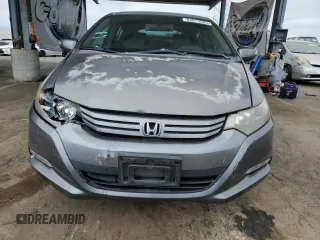 2011 Honda Insight EX with VIN JHMZE2H77BS006079, listed as a Copart auction lot 63873985 with 134,159 mi miles and Salvage title. Bid and sale history available at DreamBid. Image 5.