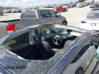 2025 Tesla Model Y Long Range with VIN 7SAYGDED3SA352138, listed as a IAAI auction lot 41760798 with 1,209 mi miles and . Bid and sale history available at DreamBid. Image 18.