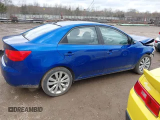 2010 Kia Forte SX with VIN KNAFW4A3XA5250341, listed as a IAAI auction lot 41698461 with 124,334 mi miles. Bid and sale history available at carsss.com. Image 13.