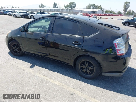 2007 Toyota Prius with VIN JTDKB20U177665184, listed as a IAAI auction lot 42673560 with 209,925 mi miles and . Bid and sale history available at DreamBid. Image 3.