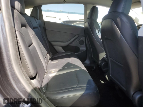 2024 Tesla Model Y with VIN 7SAYGDED7RF056973, listed as a Copart auction lot 55310705 with 15,391 mi miles and Salvage Title. Bid and sale history available at DreamBid. Image 10.