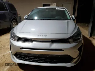 2023 Kia Rio S with VIN 3KPA24AD0PE603054, listed as a Copart auction lot 42997495 with 26,573 mi miles and Salvage Title. Bid and sale history available at carsss.com. Image 5.