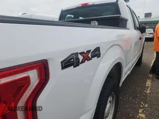 2017 Ford F-150 XL with VIN 1FTEX1E82HKD27618, listed as a IAAI auction lot 42796140 with 124,457 mi miles and . Bid and sale history available at DreamBid. Image 9.