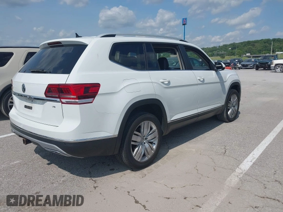 2019 Volkswagen Atlas SEL with VIN 1V2ER2CA0KC512305, listed as a IAAI auction lot 42400428 with 137,516 mi miles and . Bid and sale history available at DreamBid. Image 4.