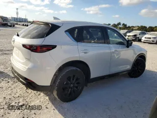 2024 Mazda CX-5 2.5 Carbon Turbo with VIN JM3KFBAY3R0445814, listed as a Copart auction lot 43348095 with 5,257 mi miles and Salvage Title. Bid and sale history available at carsss.com. Image 3.