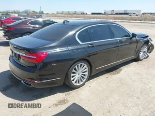 2017 BMW 7 Series 740i xDrive with VIN WBA7E4C50HGU99106, listed as a IAAI auction lot 41997603 with 138,322 mi miles. Bid and sale history available at carsss.com. Image 4.