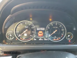 2014 BMW 6 Series 650i xDrive z VIN WBA6B4C54ED371520, wystawiony jako Copart lot #75107784 z przebiegiem 136 077 mil mil oraz Szkoda całkowita • Salvage title. Historia ofert i sprzedaży dostępna na DreamBid. Obrazek 9.