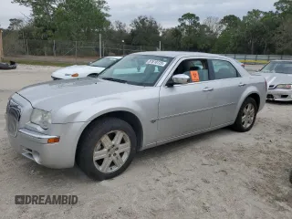 2006 Chrysler 300 C with VIN 2C3KK63H86H345499, listed as a Copart auction lot 87610725 with 171,589 mi miles and Salvage Title. Bid and sale history available at carsss.com. Image 1.