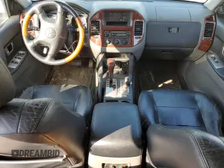 2003 Mitsubishi Montero LTD with VIN JA4NW51S53J043646, listed as a Copart auction lot 57050704 with 214,720 mi miles and Clean Title. Bid and sale history available at carsss.com. Image 8.