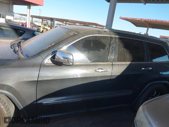 2011 Jeep Grand Cherokee Overland with VIN 1J4RR6GT1BC541506, listed as a IAAI auction lot 41850203 with 177,287 mi miles and . Bid and sale history available at DreamBid. Image 14.