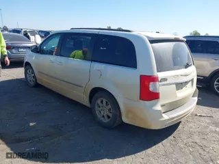 2011 Chrysler Town & Country Touring with VIN 2A4RR5DG0BR719835, listed as a IAAI auction lot 42018522 with 181,678 mi miles. Bid and sale history available at carsss.com. Image 3.