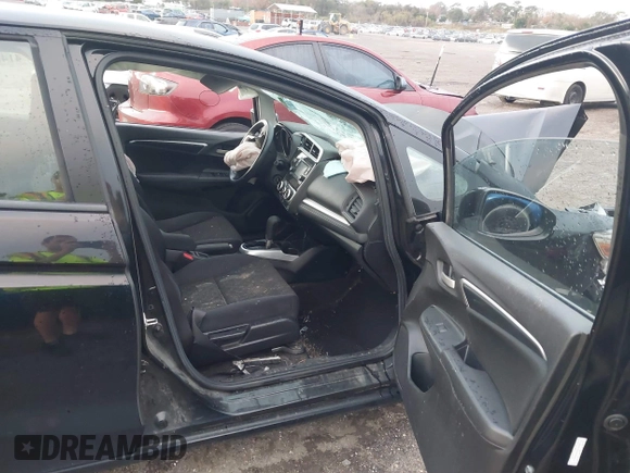 2017 Honda Fit LX with VIN JHMGK5H53HS006718, listed as a IAAI auction lot 41482503 with 77,164 mi miles. Bid and sale history available at carsss.com. Image 5.